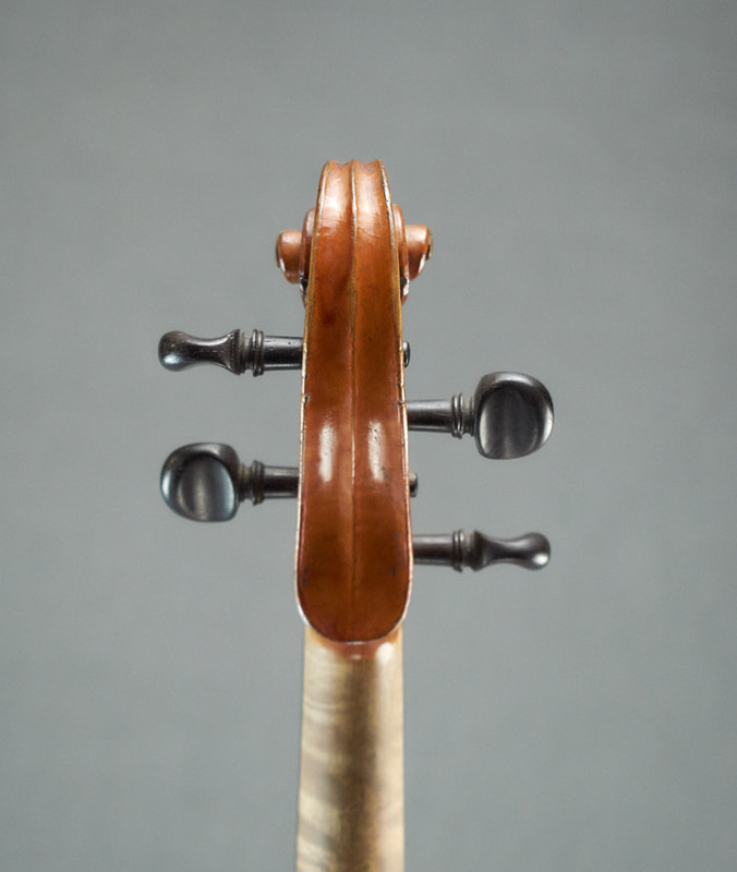 Scroll of Chappuy Violin, a class French antique instrument (back view)