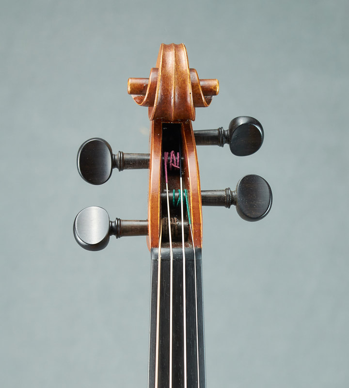 The scroll of a Bergonzi Model Violin by RAB Trust, with exceptional sound and playability (front view).