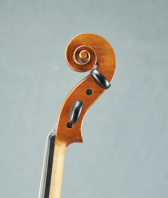 The scroll of a Bergonzi Model Violin by RAB Trust, with exceptional sound and playability (side view).